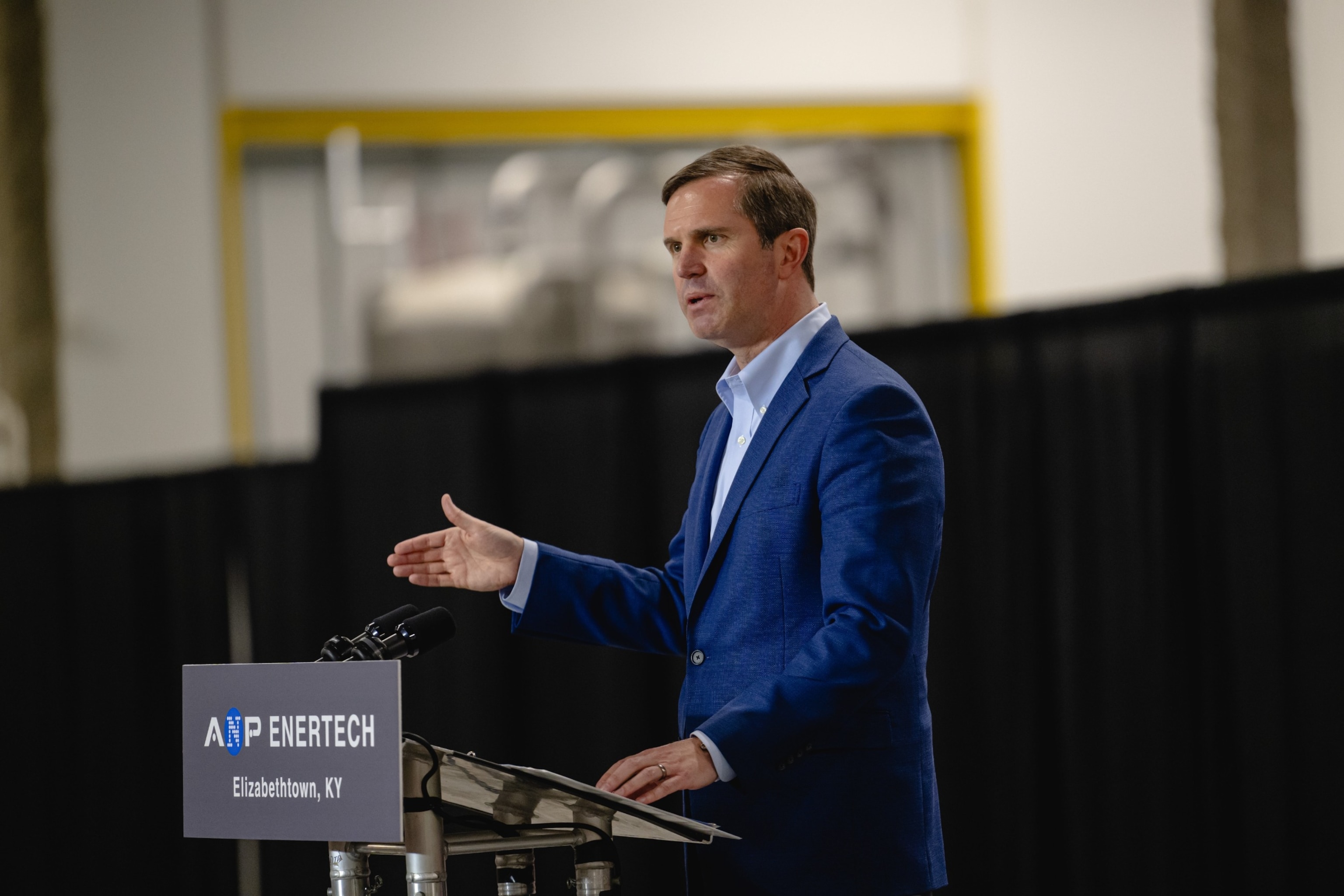 PHOTO: Andy Beshear, governor of Kentucky, speaks following a tour of the new Advanced Nano Products (ANP) battery facility in Elizabethtown, Ky., March 13, 2024.